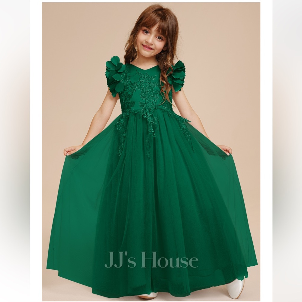 Custom made- Worn once, beautiful green dress.